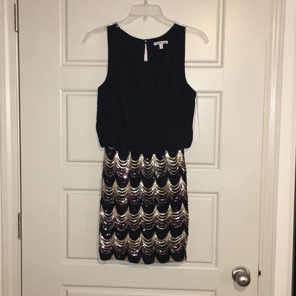 Black and gold sequined dress